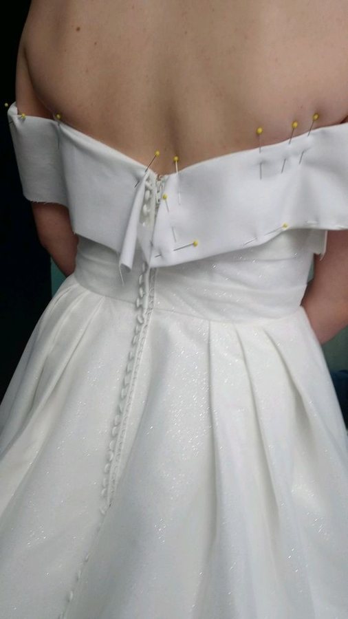 Gown changed from strapless to off the shoulder